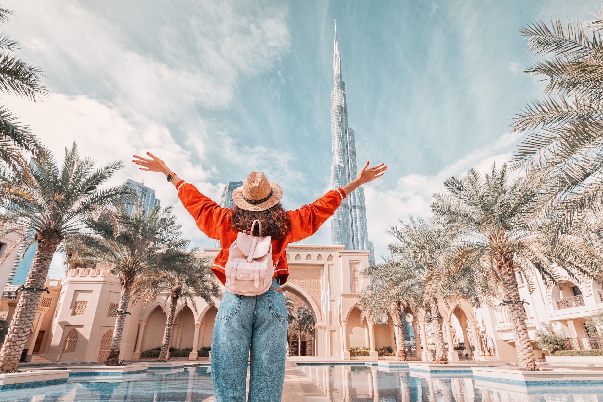 Traveler celebrating at Dubai landmark